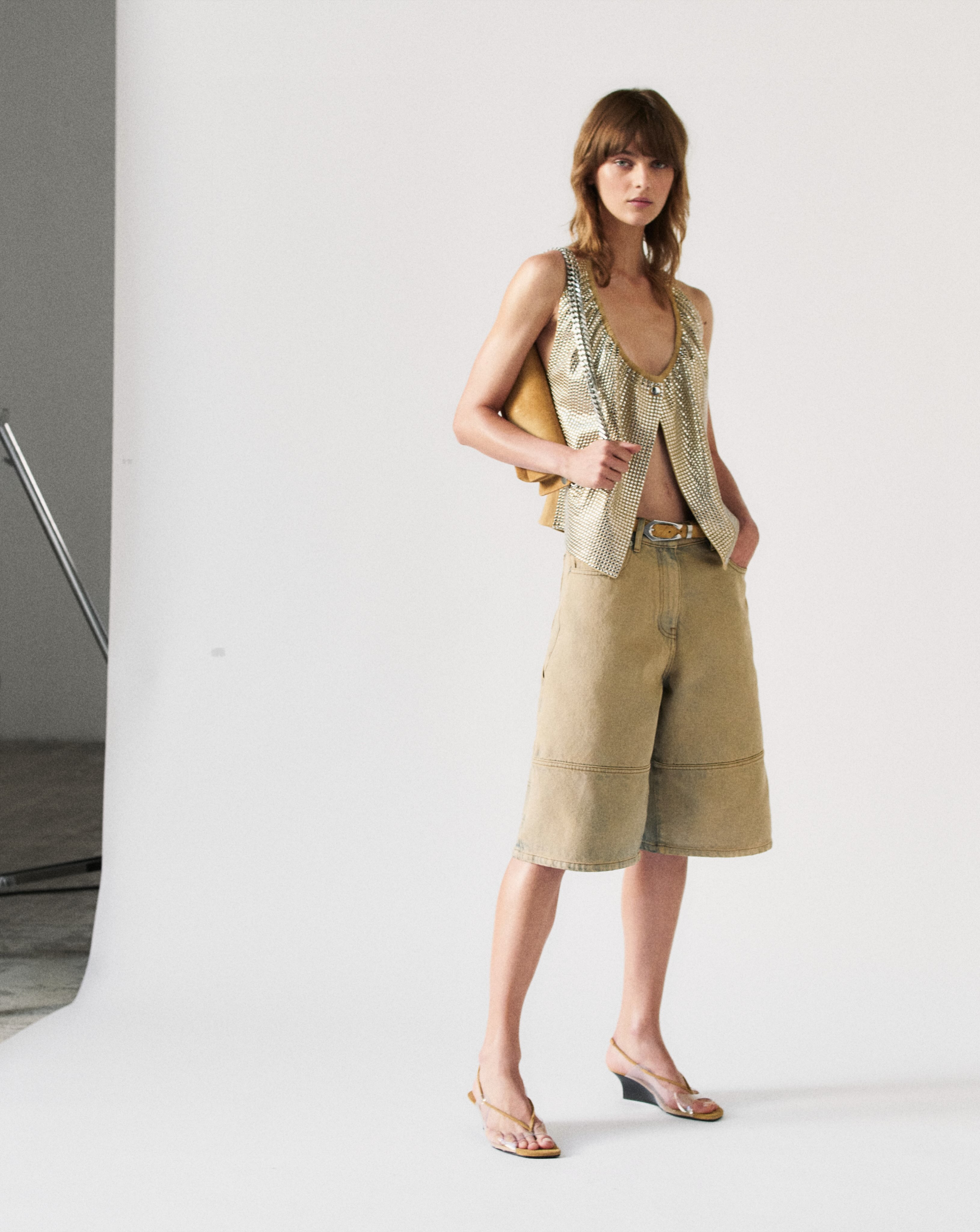 IRO unveils Summer 2027, where instinctive femininity meets the spirit of the ’90s. Sensual draping, sharp tailoring and a tension between romance and rock define the new silhouette, moving effortlessly from day to night.

Sun-washed neutrals meet acid colour, delicate lace and floral prints, while leather, studs, mesh and raw finishes bring an unmistakable IRO edge. For High Summer, the mood shifts to the south of Spain, with earthy tones, tie-dye, sequins and crochet evoking an endless poolside summer.

A wardrobe for the IRO woman in all her contrasts, sensual, effortless and unapologetically cool.